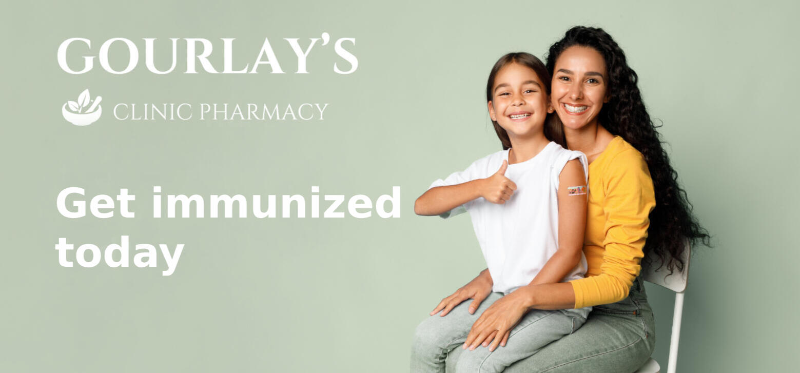 A smiling woman with teen who has a vaccine bandage on her shoulder sitting on her lap